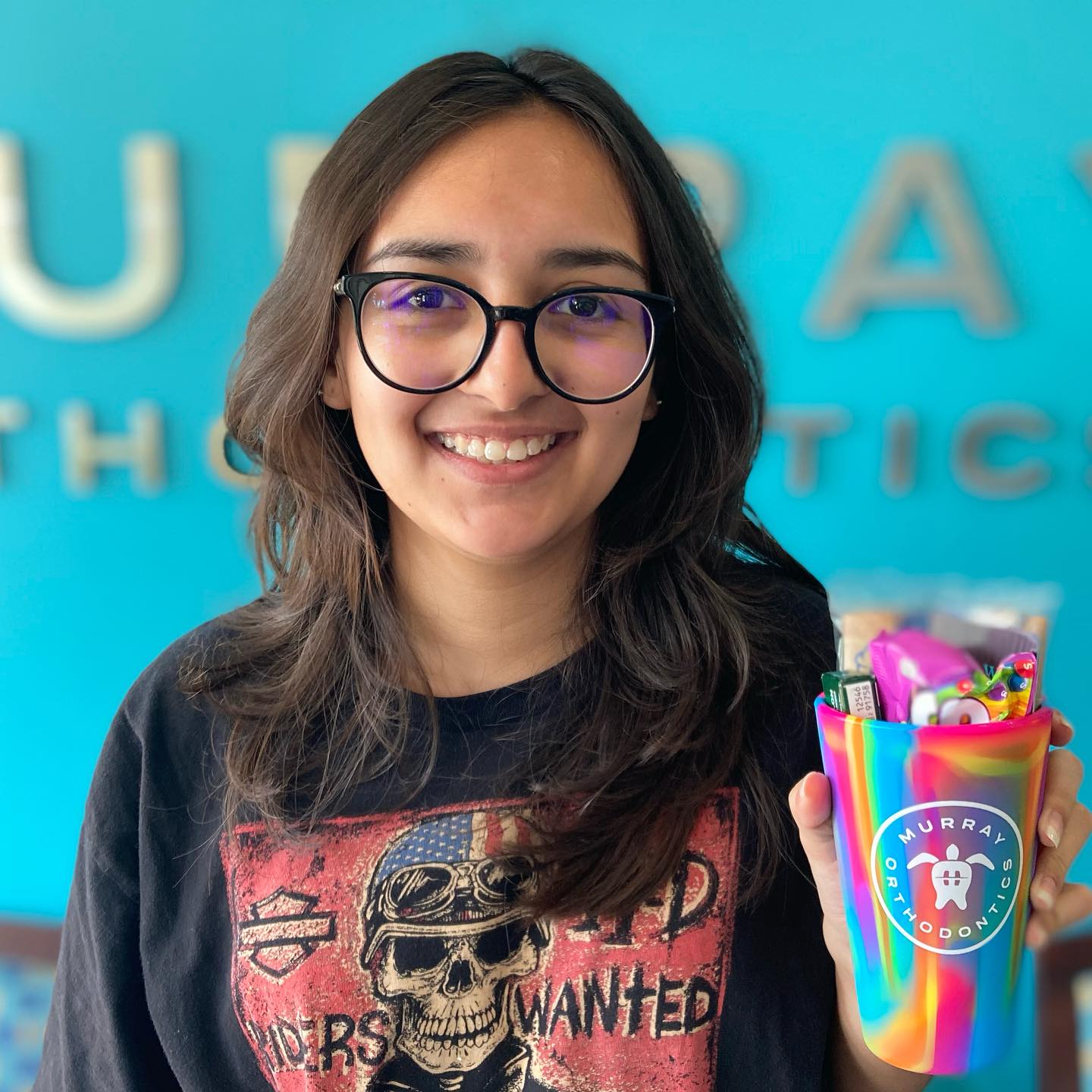Happy patient smiling at Murray Orthodontics office in Palm Beach Gardens near Jupiter FL