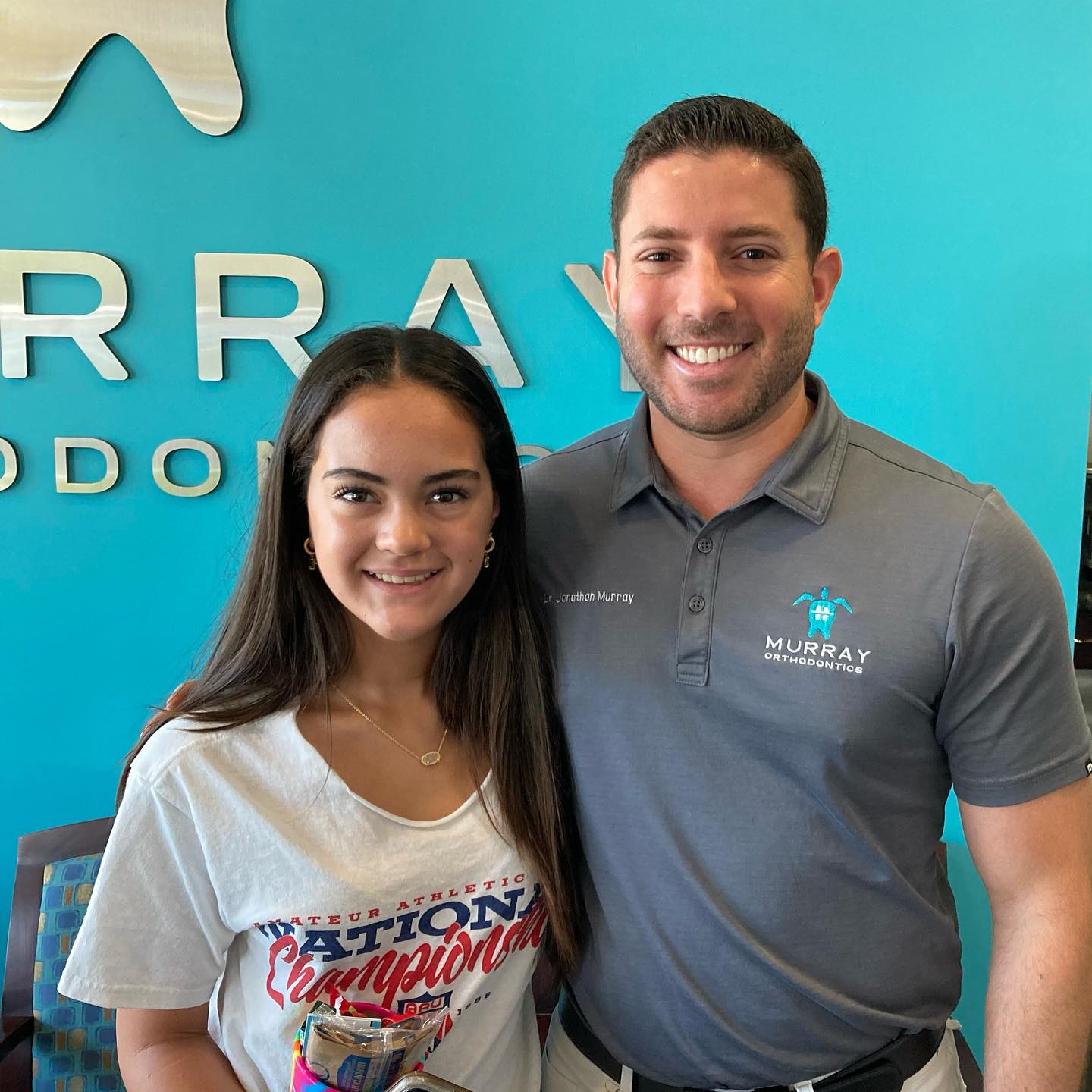 Dr. Murray with a braces patient at Murray Orthodontics Royal Palm Beach